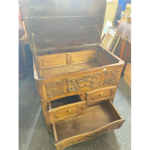 1705 - An early 19th Century oak shaped front chest with lift up top 33 inches wide