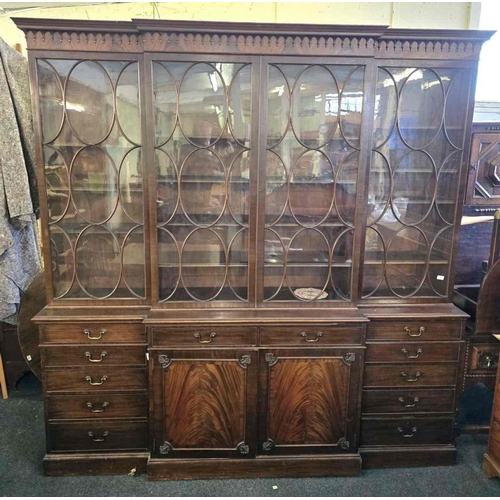 1706 - A good quality large break front mahogany book case with glazed top and a wider base with drawers an... 