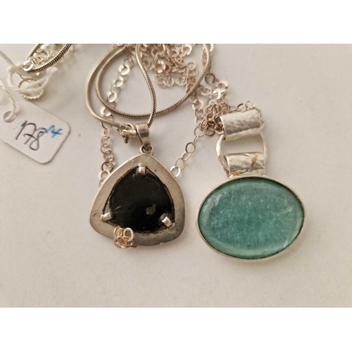 178 - Two fancy silver pendant necklaces, one being a designer example