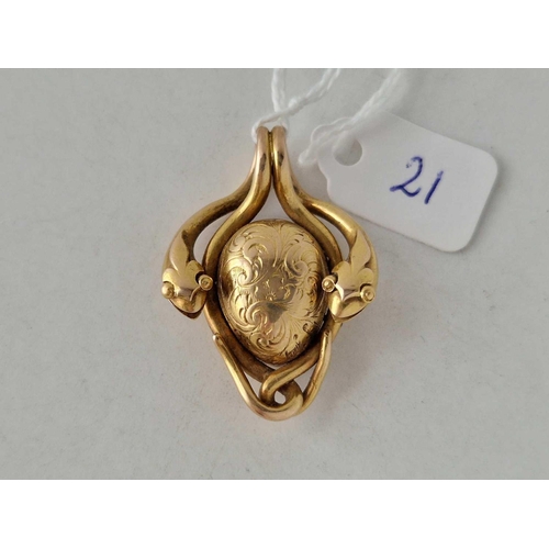 21 - A VICTORIAN LOCKET PENDANT WITH COILED SNAKES 18C GOLD 14.7 GMS