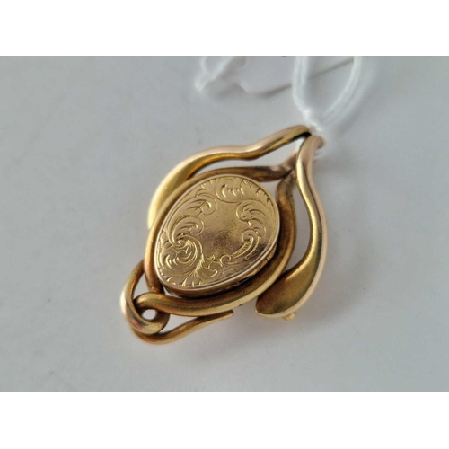 21 - A VICTORIAN LOCKET PENDANT WITH COILED SNAKES 18C GOLD 14.7 GMS