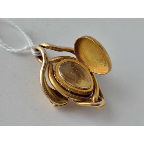 21 - A VICTORIAN LOCKET PENDANT WITH COILED SNAKES 18C GOLD 14.7 GMS