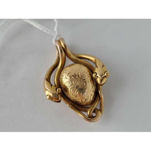 21 - A VICTORIAN LOCKET PENDANT WITH COILED SNAKES 18C GOLD 14.7 GMS