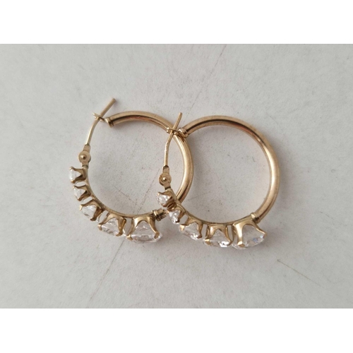 210 - A pair of hoop stone set earrings 9ct 2.2 gms