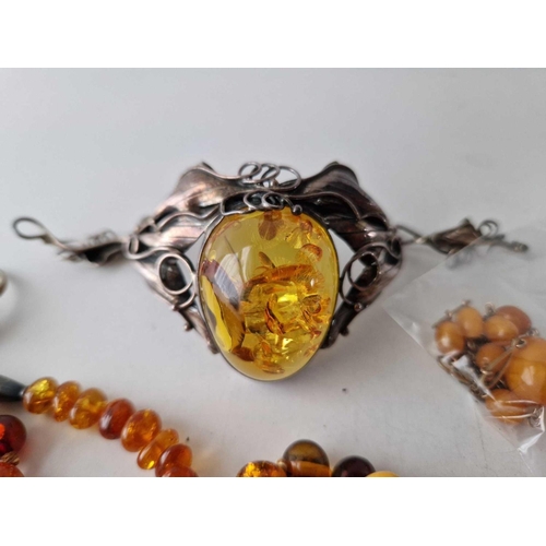 211 - A bag of assorted amber necklaces