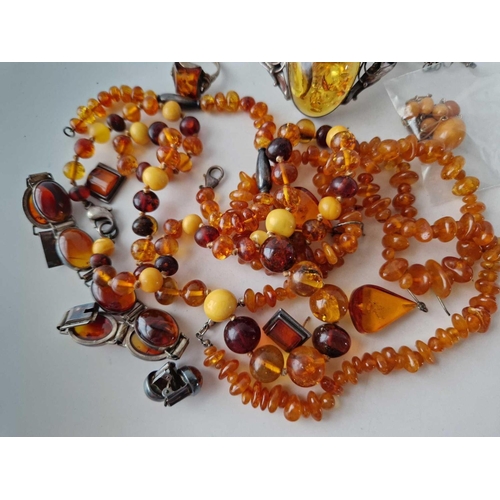 211 - A bag of assorted amber necklaces