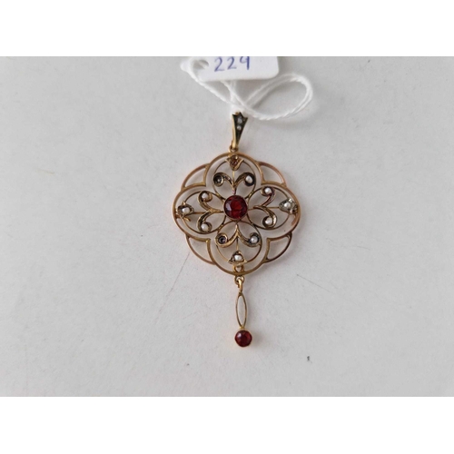 229 - A antique red stone and pearl pendant 9ct 3.3 gms