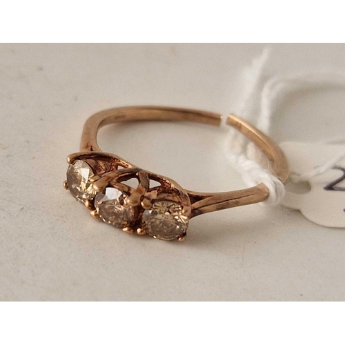 242 - A 3 stone cognac diamond ring in 9ct rose gold approx 70pts of diamond in 9ct rose gold a/f