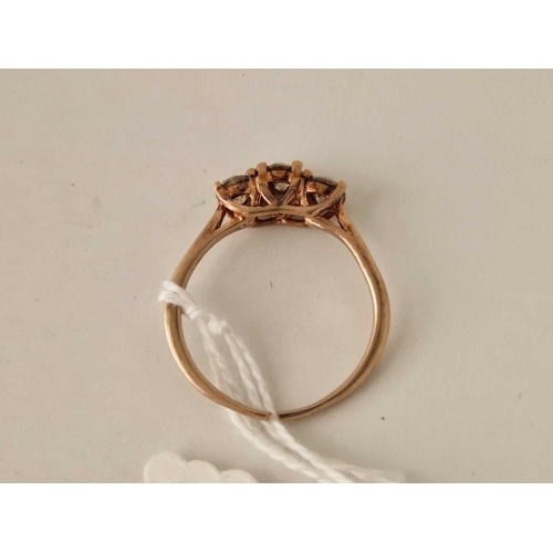 242 - A 3 stone cognac diamond ring in 9ct rose gold approx 70pts of diamond in 9ct rose gold a/f