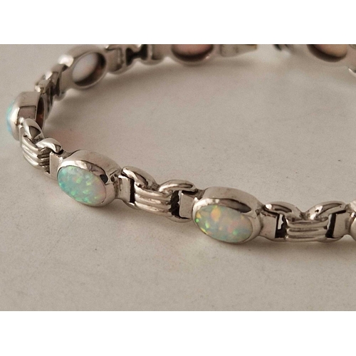 255 - A WHITE GOLD OPAL BRACELET 14CT GOLD 7 INCH 14.6 GMS