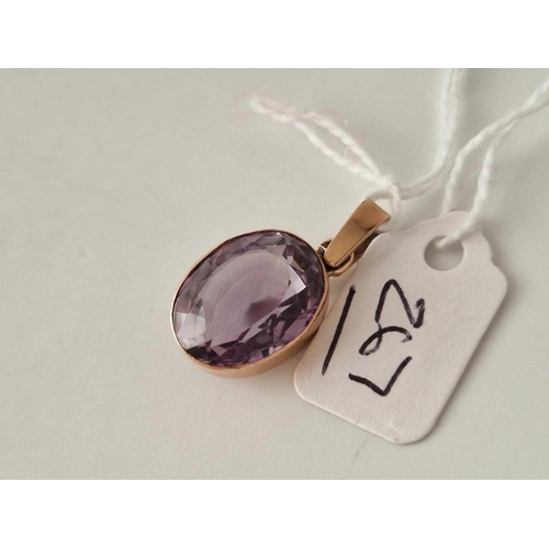 267 - A purple gem stone pendant