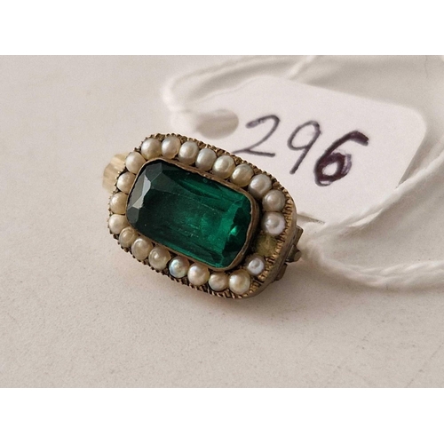 296 - An antique brooch with green stone and pearl body A/F