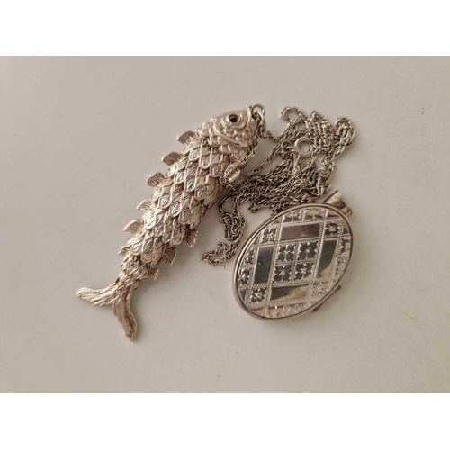 344 - A large silver fish pendant on chain and silver locket, 35 g