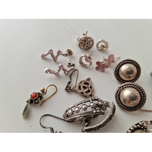 348 - Ten pairs of silver earrings, 38 g