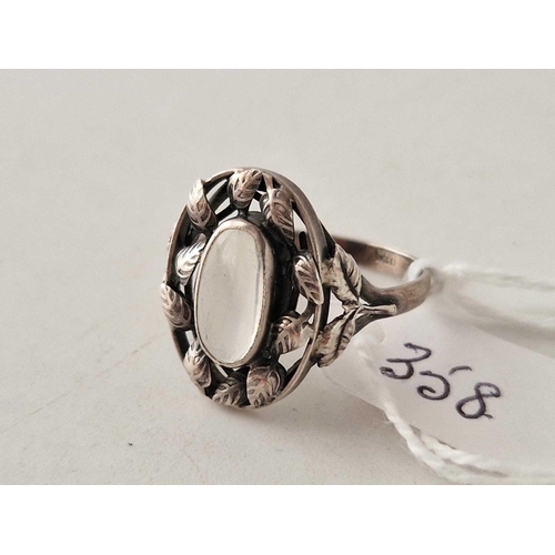 358 - A arts and crafts silver and moonstone ring size R