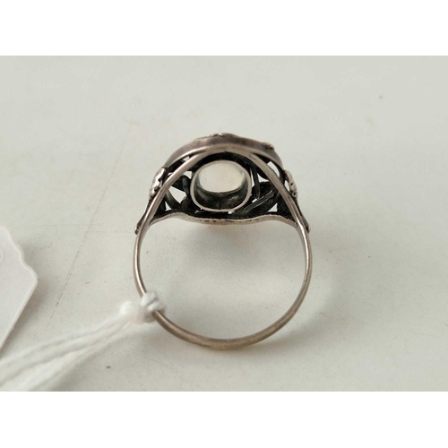 358 - A arts and crafts silver and moonstone ring size R