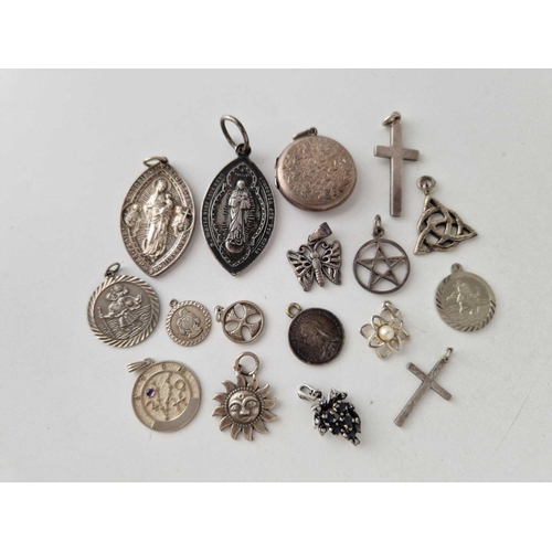 364 - Sixteen silver pendants and lockets, 79 g