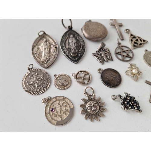 364 - Sixteen silver pendants and lockets, 79 g