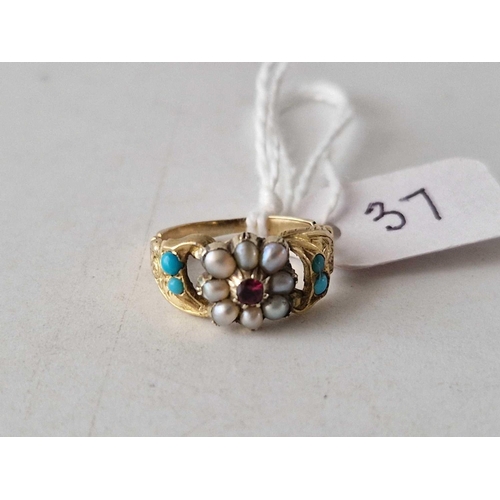 37 - A Victorian pretty gold ring set with half pearls turquoise and a central garnet size G 2.3 gms