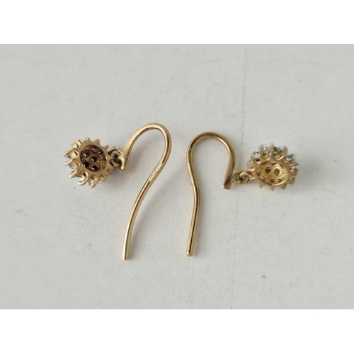 370 - A pair of diamond cluster drop earrings