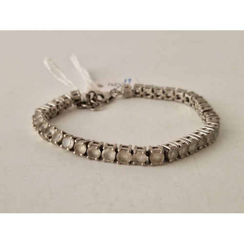 371 - A silver white stone tennis bracelet, 6.5 inches