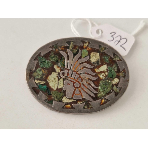 372 - An Anton Taxco silver Aztec enamel brooch, 17 g