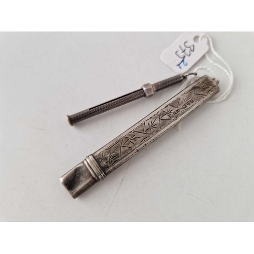 375 - A silver pencil holder and a silver toothpick