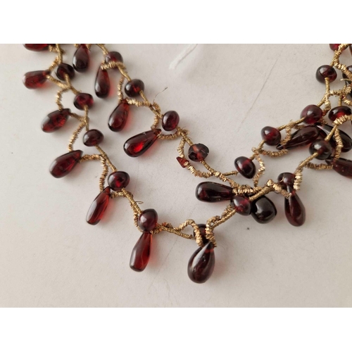 379 - A garnet roundels necklace 13 inch