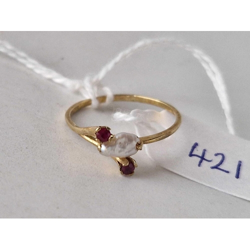 421 - A blister pearl and ruby ring 9ct size L