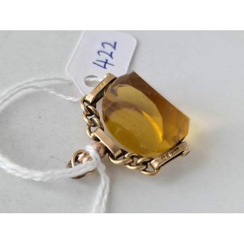 422 - A swivel fob with yellow stone 9ct