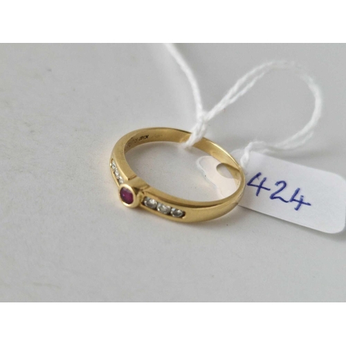 424 - A ruby and diamond ring 18c gold size P 2.7 gms