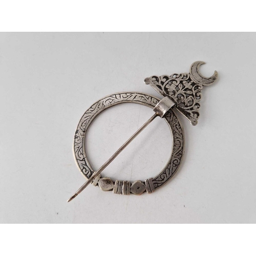 439 - A tribal silver cloak pin 4.5 inch