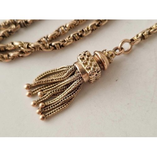 455 - A VICTORIAN GOLD CHAIN  AND TASSEL ALBERT 9CT 22 INCH 19.8 GMS