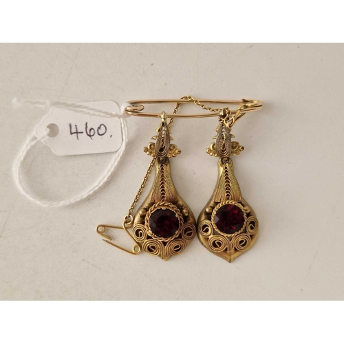 460 - A pair of gold converted earrings on pin