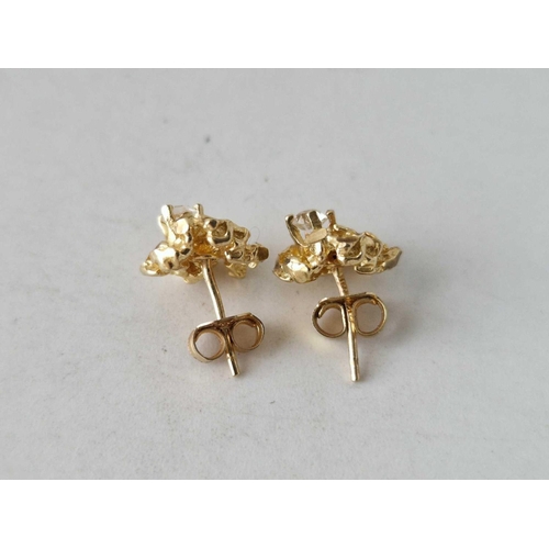 462 - A pair of modernistic er studs 14ct gold 2 gms