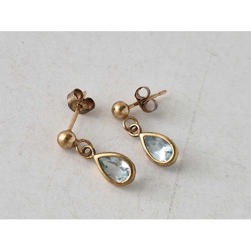 464 - A pair of topaz earrings 9ct