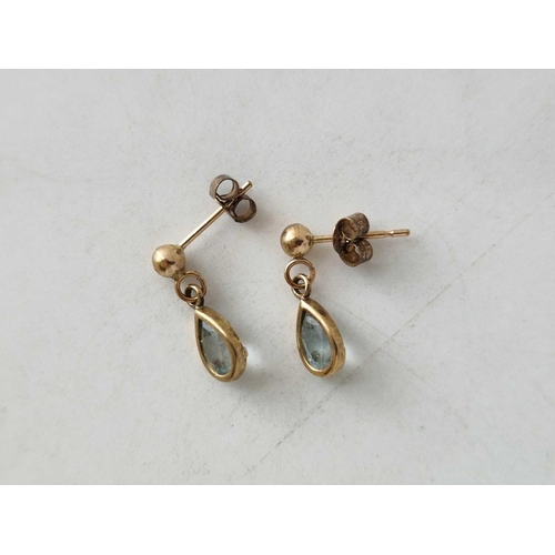 464 - A pair of topaz earrings 9ct