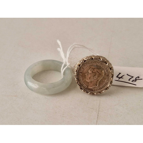 478 - A silver ring and a jade ring