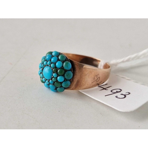 493 - A Georgian gold ring set with a dome of turquoise, dated 1805, size N, 3.2 g