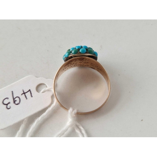 493 - A Georgian gold ring set with a dome of turquoise, dated 1805, size N, 3.2 g