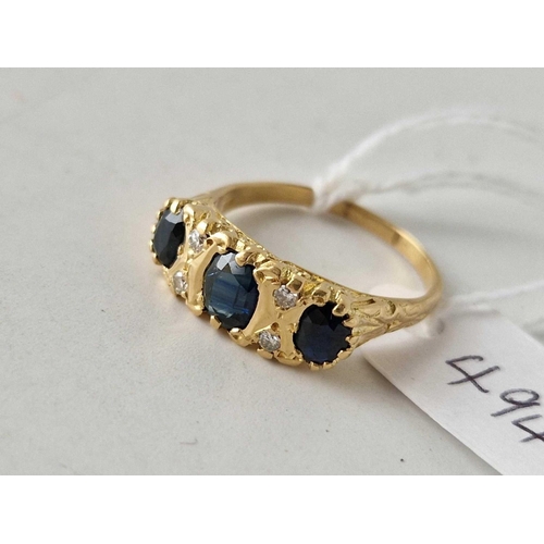 494 - A SEVEN STONE SAPPHIRE AND DIAMOND RING, 18ct, size P, 5.1 g