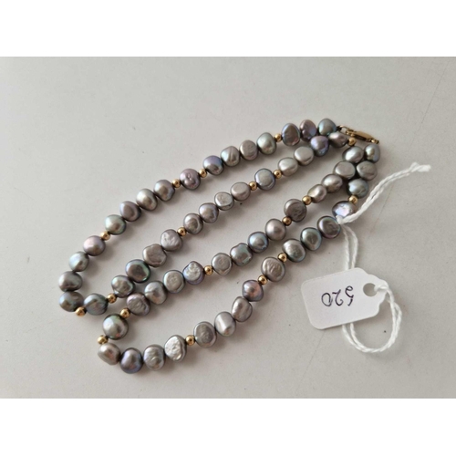 520 - A pearl necklace, 9ct, 18 inch