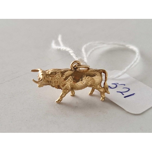 521 - A high carat gold bull charm 2.8 gms