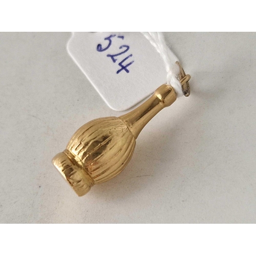 524 - A bottle charm 18ct gold 1.8 gms