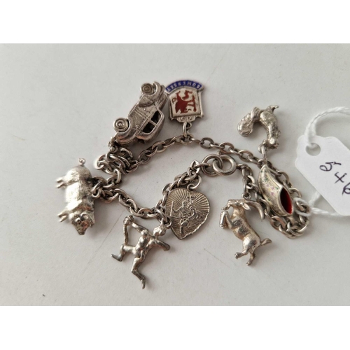 546 - A silver charm bracelet, 20 g.