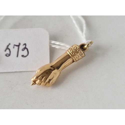 573 - A gold hand charm