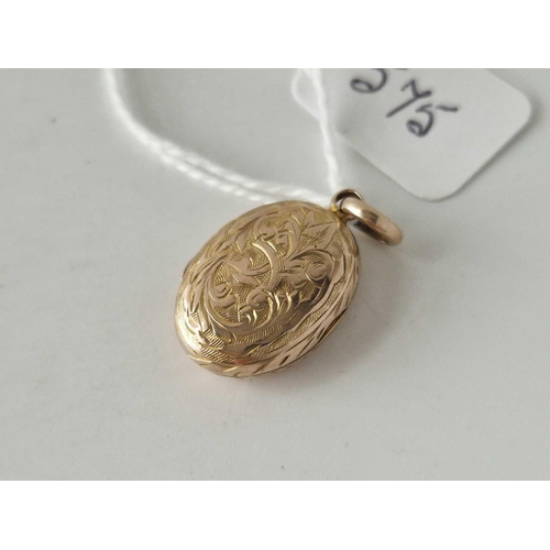 575 - A pretty oval locket 9ct 1.5 gms