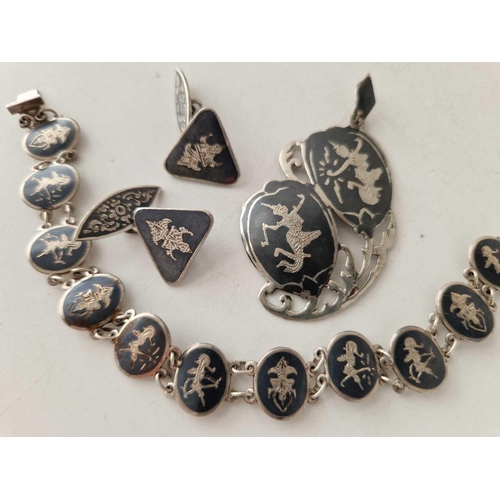 632 - A silver siam bracelet pendant and pair of cufflinks