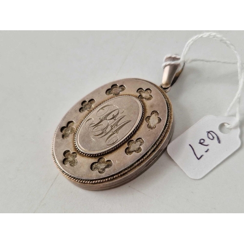 657 - An oval Victorian silver locket