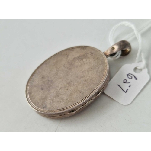 657 - An oval Victorian silver locket